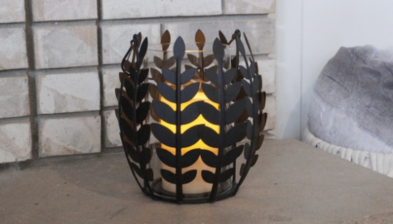 Add an elegant touch to your home with The Decorative Leaf Basket with Flameless Candle!