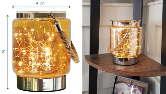 This jar is made out of an elegant, copper colored glass and it houses 20 LED fairy lights. Each little light sparkles and bounces off the glass to give off a warm glowing light effect.