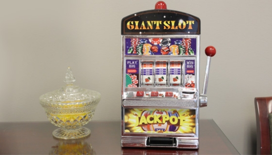 Bring the excitement of a Las Vegas casino into your own home with this Slot Machine that plays AND pays like a real slot machine, but is really a bank! Designed to look like an authentic slot machine, it features a flashing jackpot light and casino sounds and it actually pays out when a jackpot is hit!