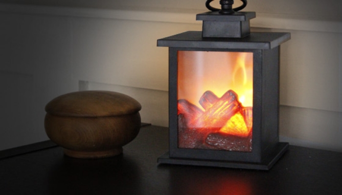 This antique-style fireplace lantern delivers a wonderful ambient glow showing off its realistic LED Flickering Flame Effect. This next-generation flickering technology gives off a stunning effect complete with glowing logs.