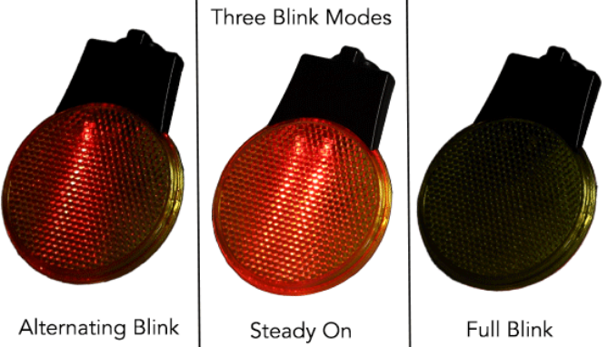 This is the perfect safety tool for walking or biking. It's a round yellow plastic reflector that can be turned on to feature 3 red blinking light settings(flashing left to right, blinking, and solid) and has a handy clip that allow you to affix it to a backpack, purse, zipper pull, or whatever ever you need to be more visible to cars and others at night.