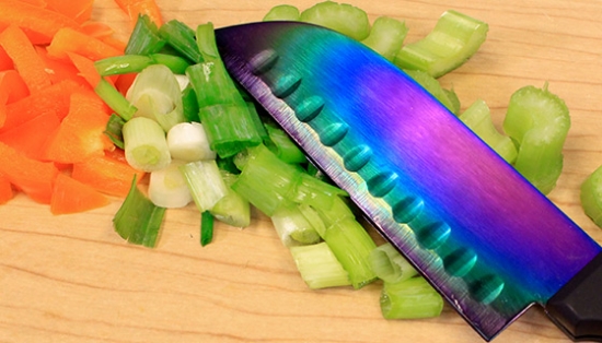 The Rainbow Knife Pro follows the ever-popular Japanese Santoku design, famous for its versatility and efficiency in the kitchen. But this one is so much more!