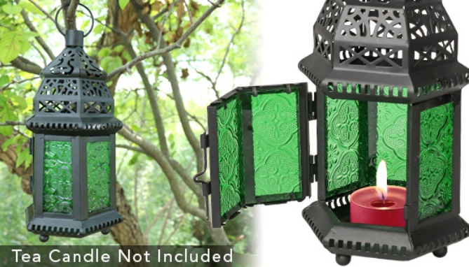 The mystery and glamour of our Moroccan lanterns amp up your design element! The combination of intricate metal cutouts and ornate glass designs create a gorgeous effect of flickering emerald green light that can either set the tone for outdoor events or cast an exquisite glow on your tabletop.
