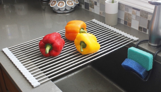 Don't waste valuable counter space! Use the Over-the-Sink Drying Rack to rinse and dry fruits or vegetables, or as a drain rack for dishes. Made of sturdy silicone-coated steel, the drying rack fits over your standard-size sink without bending,