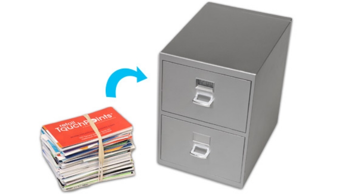 It may look like just a small-scale replica of a filing cabinet, but it serves a useful purpose! This fully-functional cabinet is designed to organize business cards, and other small odds and ends.
