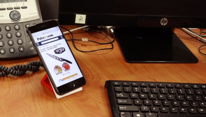 Here's one handy phone accessory no desk should be without. It's the friction phone stand: a simple yet effective stand that props your phone up to a convenient angle so you can keep an eye out for text, take conference calls, watch videos or search the web.