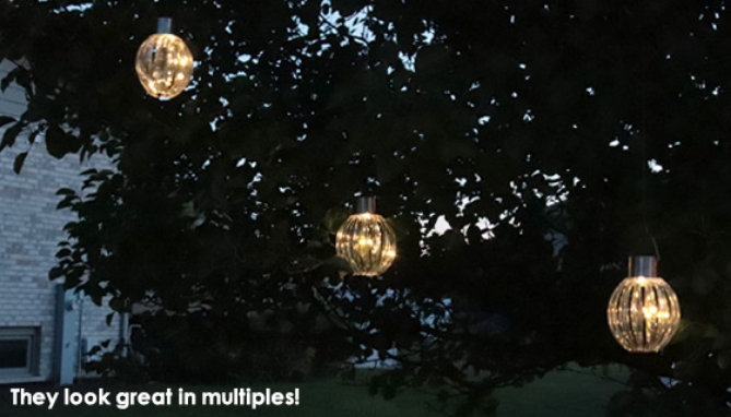 Picture 5 of Solar-Powered Slinky Outdoor Spinning LED Light