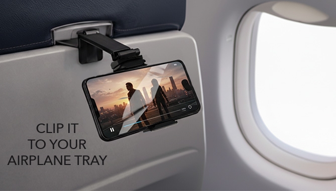 image of universal phone mount that clips to airplane tray when traveling